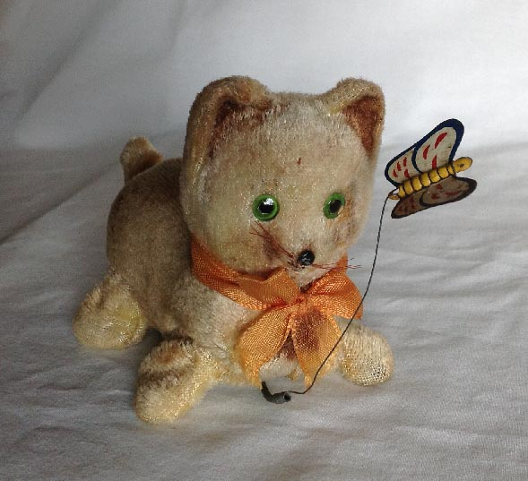 circa 1940's boxed Japanese plush covered clock work wind up Kitty and Butterfly cat toy